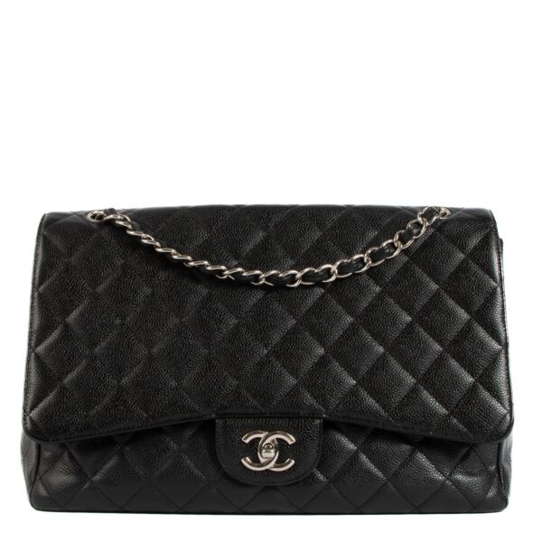 Shop safe online at Labellov in Antwerp, Brussels and Knokke this 100% authentic second hand Chanel Black Caviar Maxi Classic Single Flap Bag