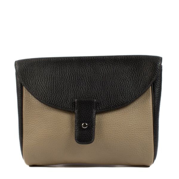 shop 100% authentic second hand Delvaux Bi-color Clutch on Labellov.com