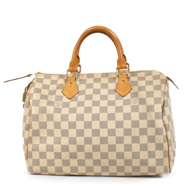 Shop safe online at Labellov in Antwerp, Brussels and Knokke this 100% authentic second hand Louis Vuitton Beige Damier Azur Speedy 30 Top Handle Bag