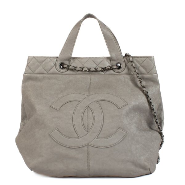Shop 100% authentic Chanel Leather Silver Tote Top Handle Bag at Labellov.com.