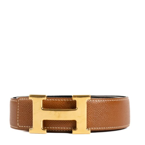 Shop safe online at Labellov in Antwerp, Brussels and Knokke this 100% authentic second hand Hermès Reversible Black and Gold Constance H Belt - Size 85