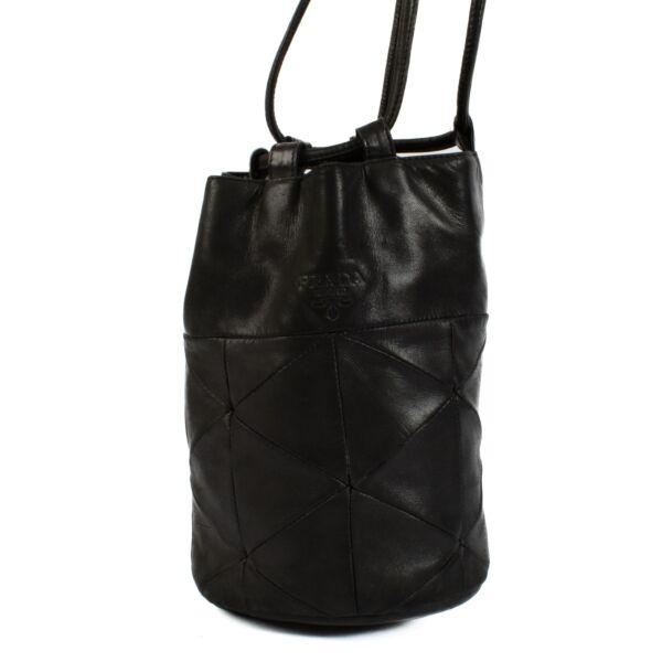 Shop 100% authentic Prada Black Leather Small Bucket Bag at Labellov.com.