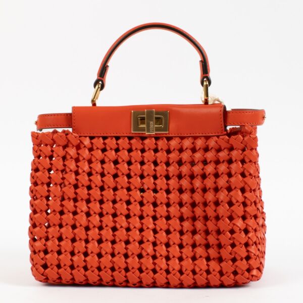 Shop safe online at Labellov in Antwerp, Brussels and Knokke this 100% authentic second hand Fendi Red Woven Leather Mini Peekaboo Bag