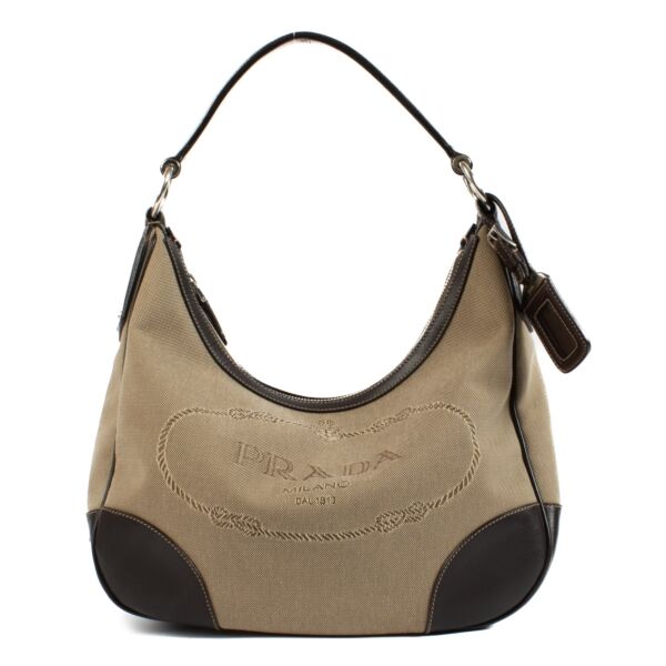 Shop safe online at Labellov in Antwerp, Brussels and knokke this 100% authentic second hand Prada Brown Logo Jacquard Hobo Shoulder Bag
