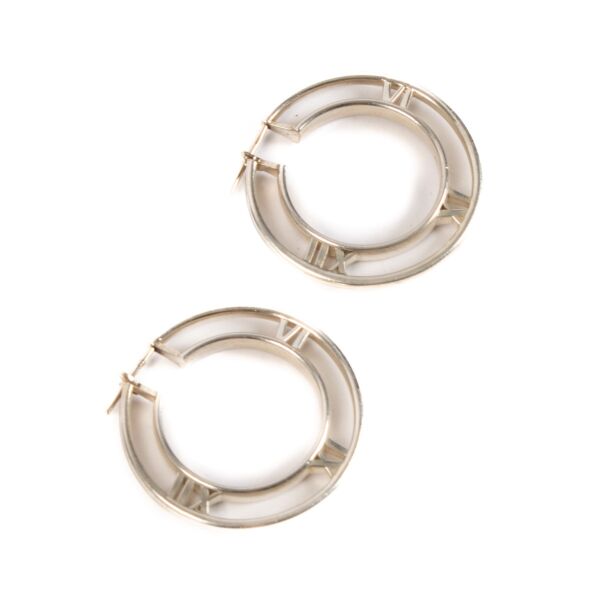shop 100% authentic second hand Tiffany & Co. Silver Atlas Roman Numeral Earrings on Labellov.com