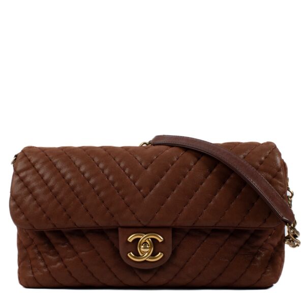 shop 100% authentic second hand Chanel Brown Shimmer Chevron Classic Flap Bag on Labellov.com