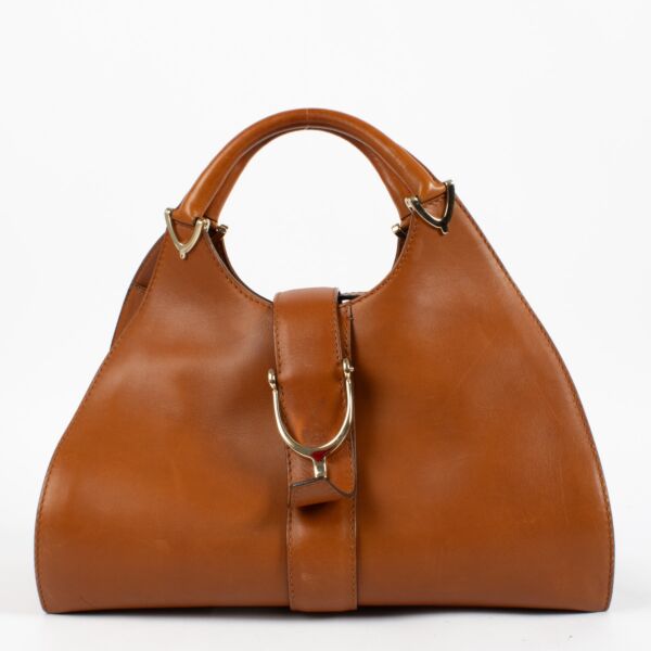 shop 100% authentic second hand Gucci Brown Stirrup Top Handle Bag on Labellov.com