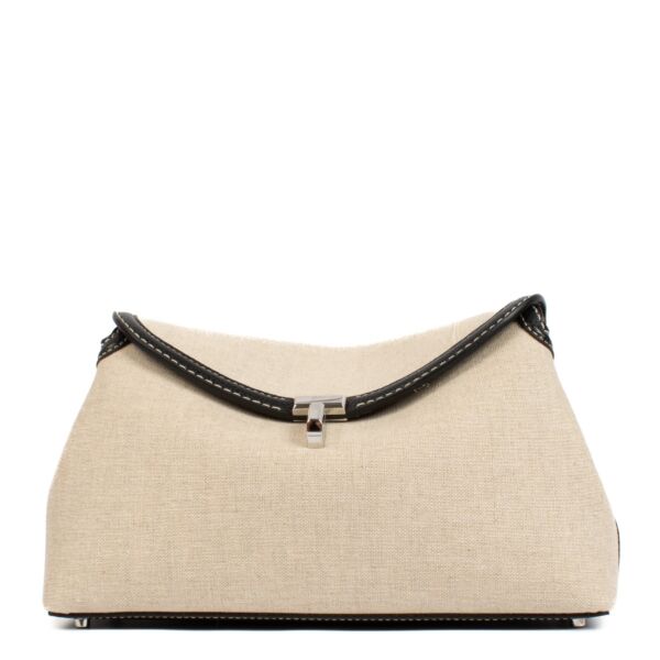 shop 100% authentic second hand Toteme T-Lock Canvas Clutch on Labellov.com