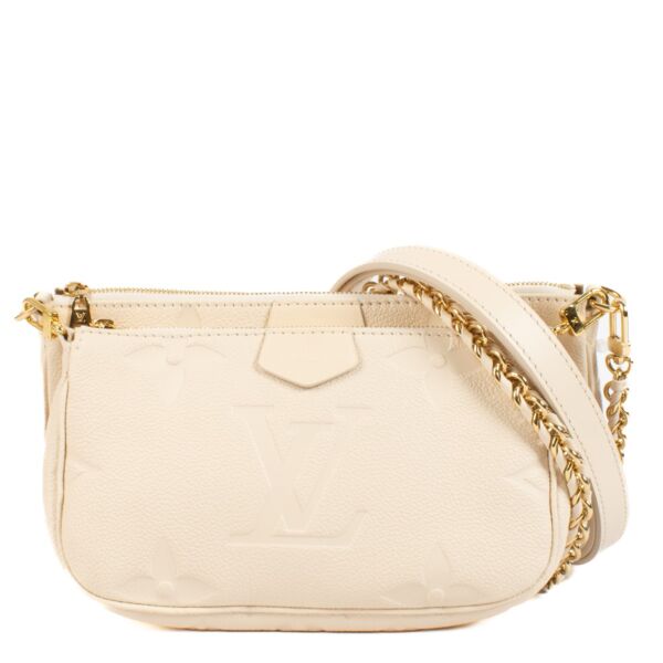 buy 100% authentic pre loved Louis Vuitton White Monogram Empreinte Multi Pochette Accessoires on Labellov.com 