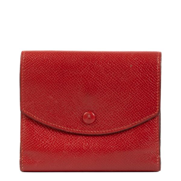 Hermès Red Leather Wallet, compact and stylish, with compartments for cards, cash, and coins in a vibrant red design. Shop now on Labellov.com.