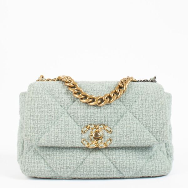 Shop safe online at Labellov in Antwerp, Brussels and Knokke this 100% authentic second hand Chanel Light Blue Tweed Medium Chanel 19 Bag