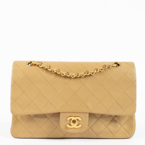 Shop safe online at Labellov in Antwerp and Knokke this 100% authentic second hand Chanel Vintage Beige Lambskin Medium Classic Flap Bag