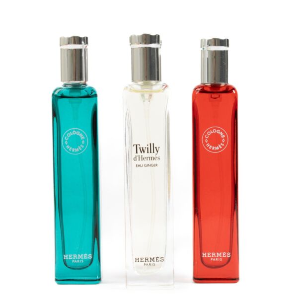 Hermès set of 3 travel perfumes, featuring 15ml bottles of Eau de Rhubarbe Écarlate, Eau de Cologne, and Eau d'Orange Verte, offering refreshing and vibrant fragrances in a compact, travel-friendly design. Shop now at Labellov.