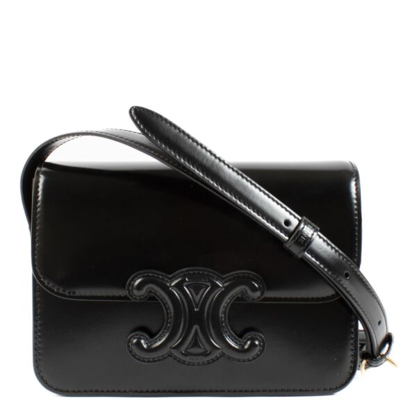 Celine All Black Teen Triomphe Bag in smooth black leather with a matching Triomphe clasp and adjustable strap for a sleek, timeless look.