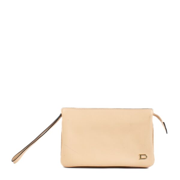 Buy authentic second hand Delvaux Nude Leather Pouch Wallet at Labellov.com 