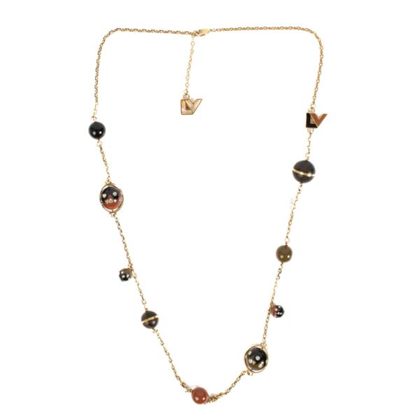 Authentic second hand Louis Vuitton Gold crystal Wood ball Long Necklace on Labellov.com 