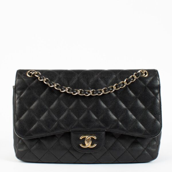 Shop safe online at Labellov in Antwerp and Knokke this 100% authentic second hand Chanel Black Caviar Large Classic Flap Bag