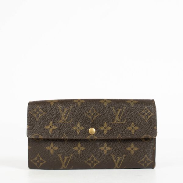 Authentic pre-loved Louis Vuitton Monogram Canvas Sarah Long Wallet on Labellov.com