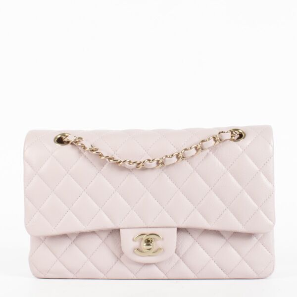 Authentic Second Hand Chanel Pale Pink Caviar Medium Classic 11.12 Bag in brand new condition with stickers on Labellov.com