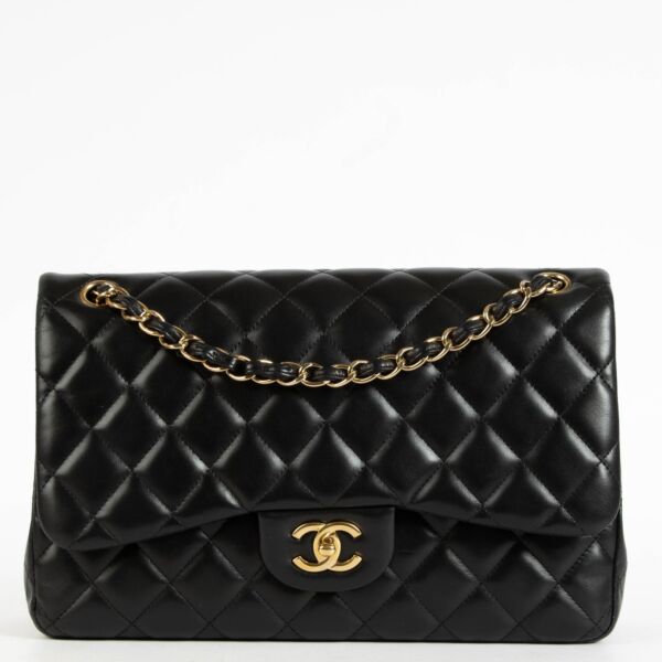 Shop the authentic Chanel Black Lambskin Large / Jumbo Classic Handbag second hand on Labellov.com.