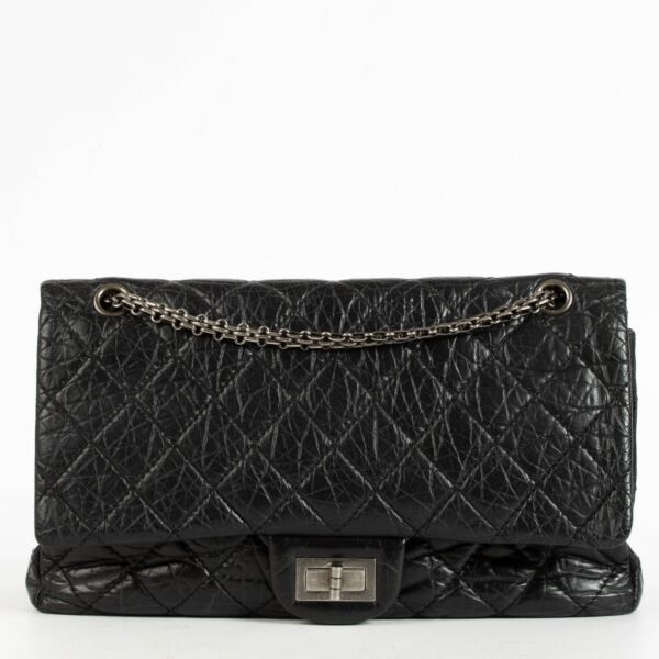 Shop the authentic Chanel Black Aged Calfskin Maxi Reissue 2.55 Bag on Labellov.com.