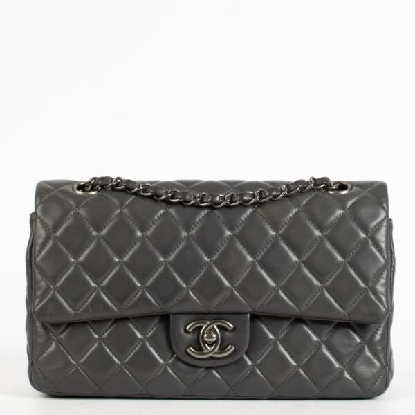 Shop the authentic Chanel Grey Lambskin Medium Classic Flap Bag second hand on Labellov.com.
