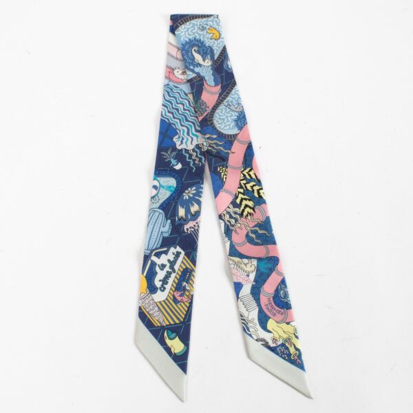 Are you looking for an authentic designer accessory? We buy and sell your preloved and brand new Hermès Blue Splash Park Twilly Scarf