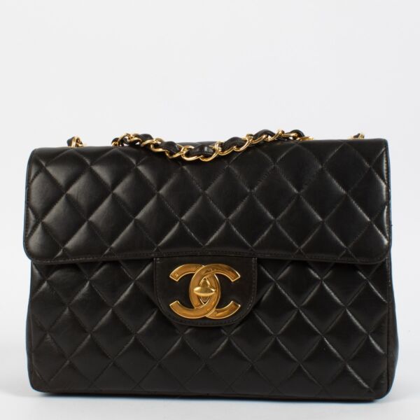 Buy 100% authentic second hand Chanel Black Lambskin Classic Flap Bag on Labellov.com