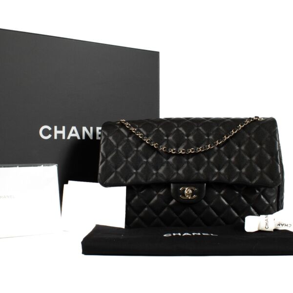 Chanel 24C Black Shiny Caviar XXL Travel Flap Bag