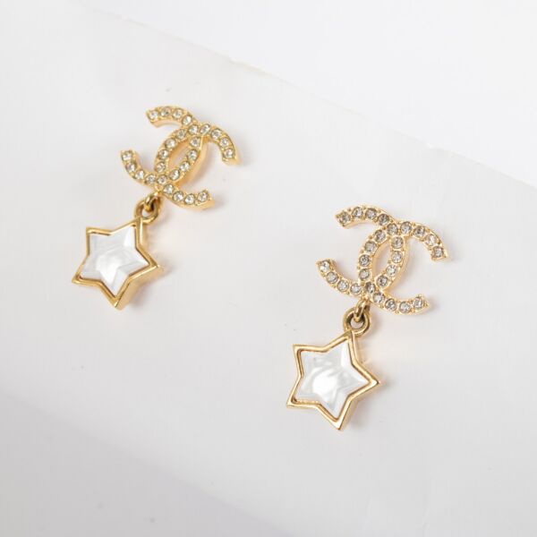 Authentic pre-loved Chanel Crystal CC Star Earrings Gold Tone 24C on Labellov.com