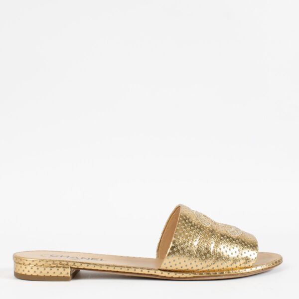 Authentic pre-loved Chanel Gold Lambskin Perforated CC Slide Sandals — Size 41
on Labellov.com
