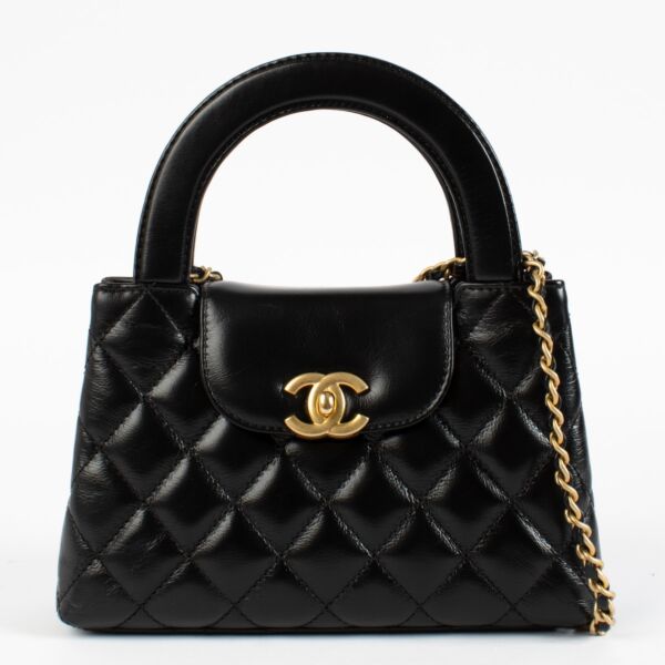 shop 100% authentic second hand Chanel Black Lambskin Kelly Nano Top Handle Bag on Labellov.com