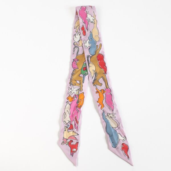 authentic preloved Hermès Mille et Un Lapins Pink Twilly Scarf on Labellov.com