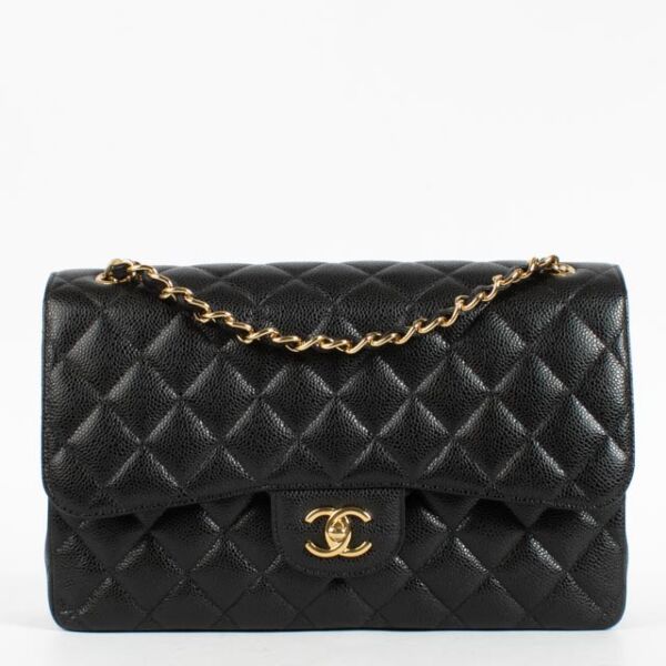 Shop the authentic Chanel Black Caviar Large Flap / Jumbo Classic Bag second hand on Labellov.com.