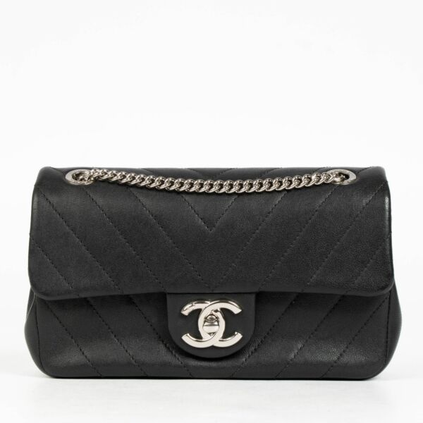 Authentic pre-loved Chanel Black Chevron Calfskin Mini Classic Rectangular Bag on Labellov.com