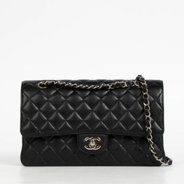 Authentic pre-loved Chanel Classic Flap Black Shoulder bag on Labellov.com