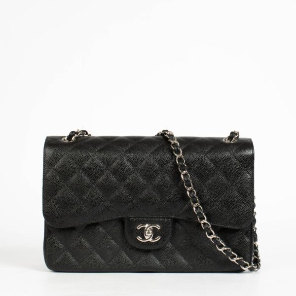 Authentic pre-loved Chanel Classic Large/Jumbo Black Caviar Flap Bag on Labellov.com