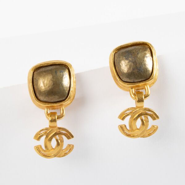 Authentic pre-loved Chanel All Gold 97A Clip Earrings on Labellov.com