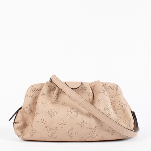 shop 100% authentic second hand Louis Vuitton Magnolia Mahina Perforated Scala Mini Pouch on Labellov.com