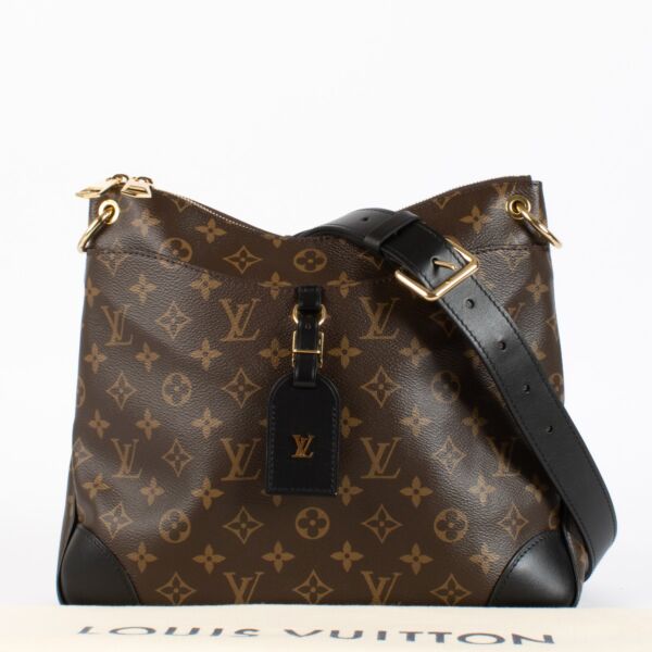 Louis Vuitton Odeon MM Monogram Canvas with black leather trim and gold-tone hardware. A chic, versatile everyday bag in excellent condition.