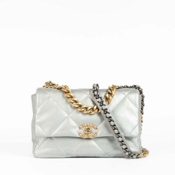 Shop this authentic Chanel Silver Lambskin Large Chanel 19 Bag pre-loved on Labellov.com 
