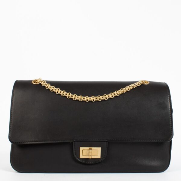 Chanel Paris–Hamburg 2.55 Maxi bag in black calfskin with gold hardware at Labellov.com