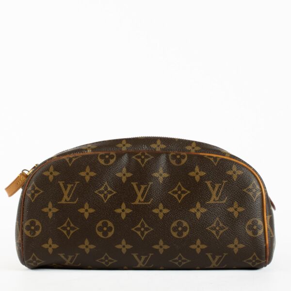 Authentic preloved Louis Vuitton Monogram Dopp Kit Toillet Pouch on Labellov.com