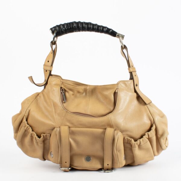 Authentic Second Hand Saint Laurent Beige Front Pocket Mombasa Bag on Labellov.com