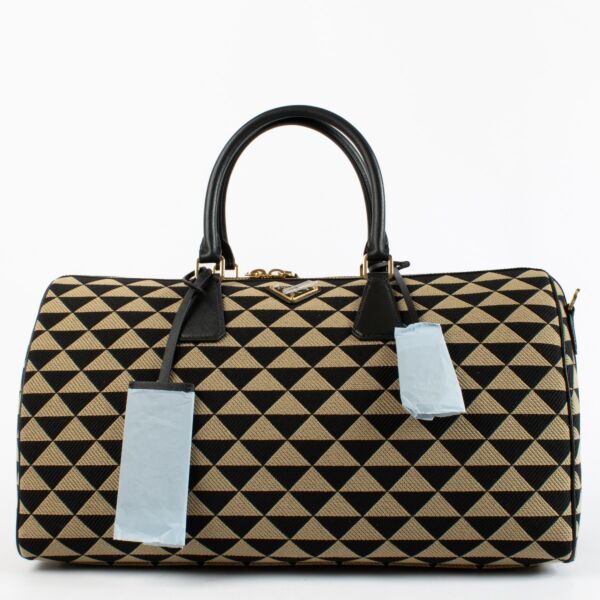 Authentic preloved Medium Symbole Embroidered Fabric Travel Bag on Labellov.com