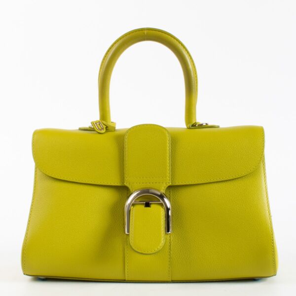 Pre-loved Delvaux Brillant East/West Mini in Absinthe Rodeo Calf. A vibrant chartreuse mini bag in excellent condition with signature Brillant buckle.