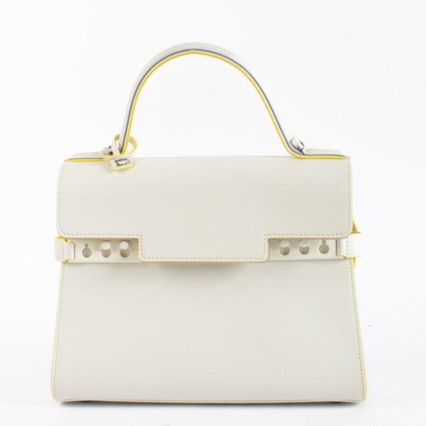 Pre-loved Delvaux Tempête MM Ruban in ivory calfskin with detachable fur strap. A rare, collectible Belgian luxury bag in excellent condition.