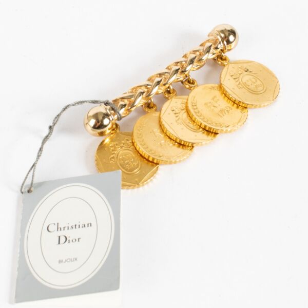Authentic second-hand Christian Dior Vintage 24K Gold Plated French Revolution Brooch on labellov.com