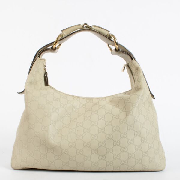 Authentic pre-loved Gucci Beige Guccissima Horsebit Small Hobo Bag on Labellov.com