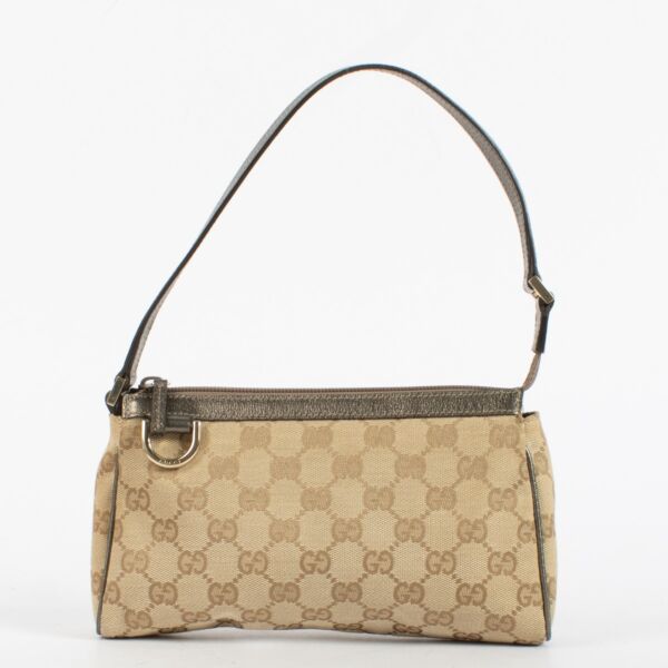Authentic pre-loved Gucci Beige GG Canvas Mini Bag on Labellov.com